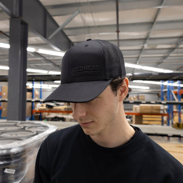 Rubber stacked black on black hat