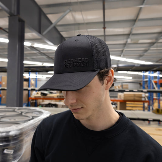 Rubber stacked black on black hat