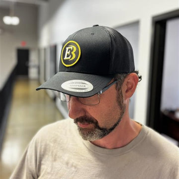 E Bourassa Yellow Circle Hat